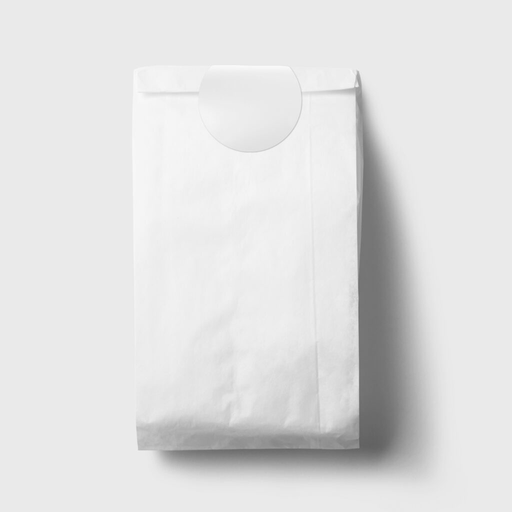 free-paper-bag-with-sticker-mockup-mockupbee