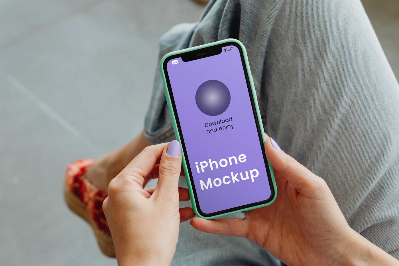 Free Phone in Hand Mockup - mockupbee