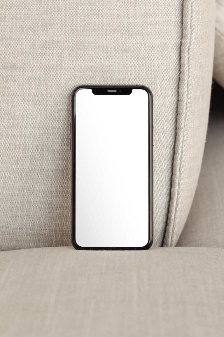 Free Standing iPhone Screen Mockup - mockupbee