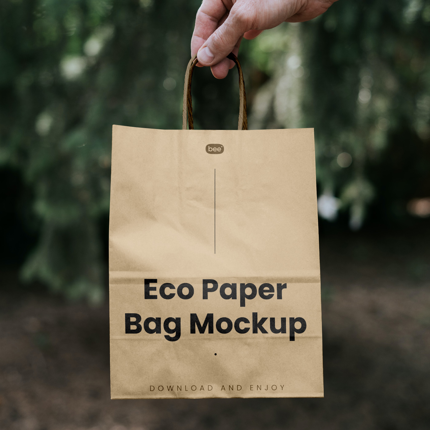 Free Paper Bag with Hand Mockup - mockupbee