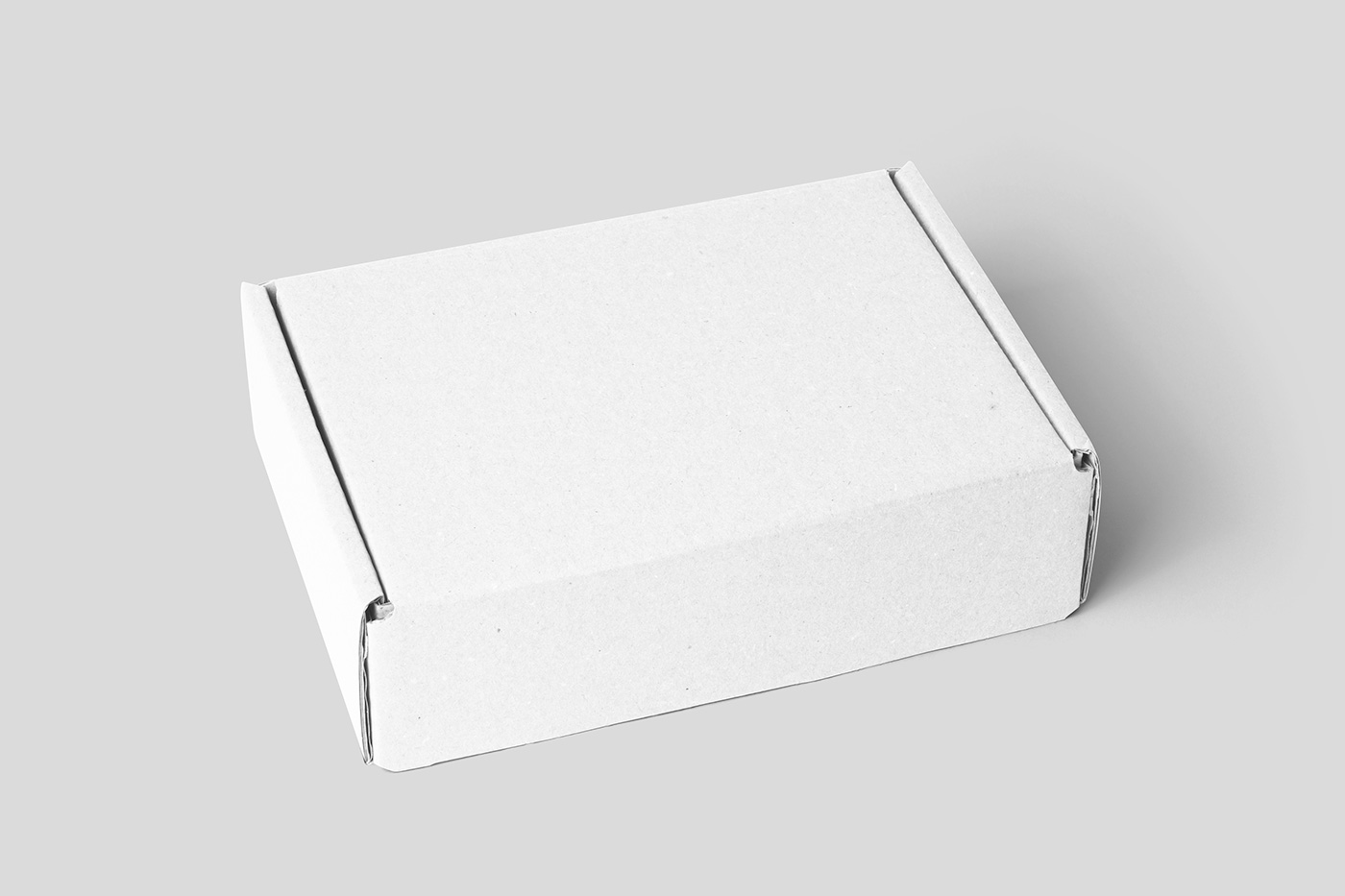Free Perspective Cardboard Box Mockup - mockupbee