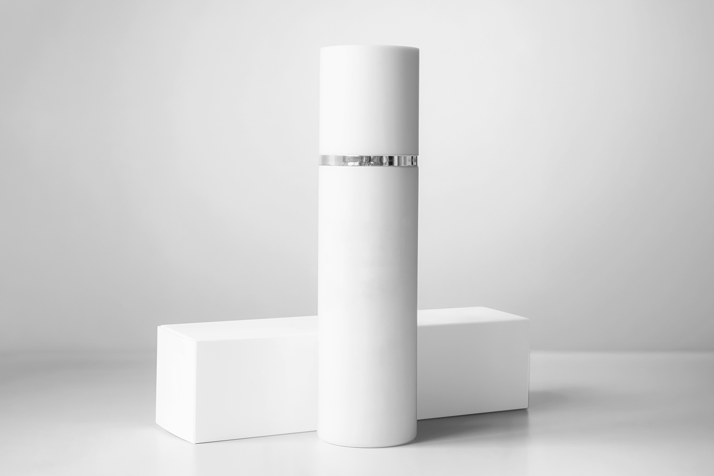 Free Cosmetic Bottle with Box Mockup