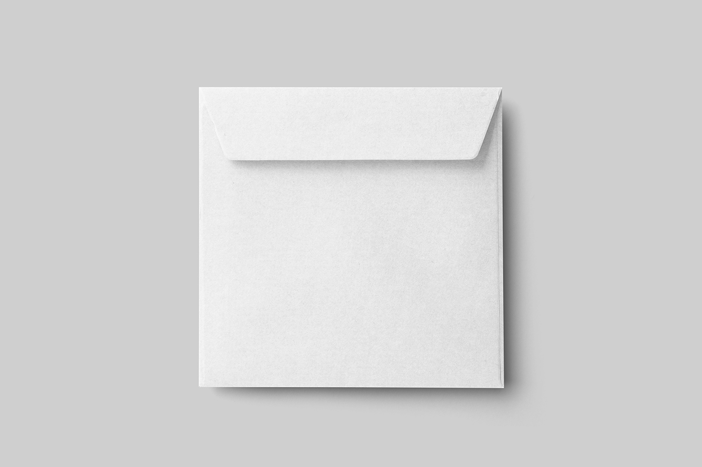 Free Lying Square Envelope Mockup - mockupbee