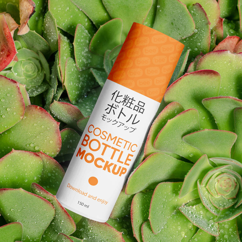 Free Cosmetic Bottle on Plant Mockup