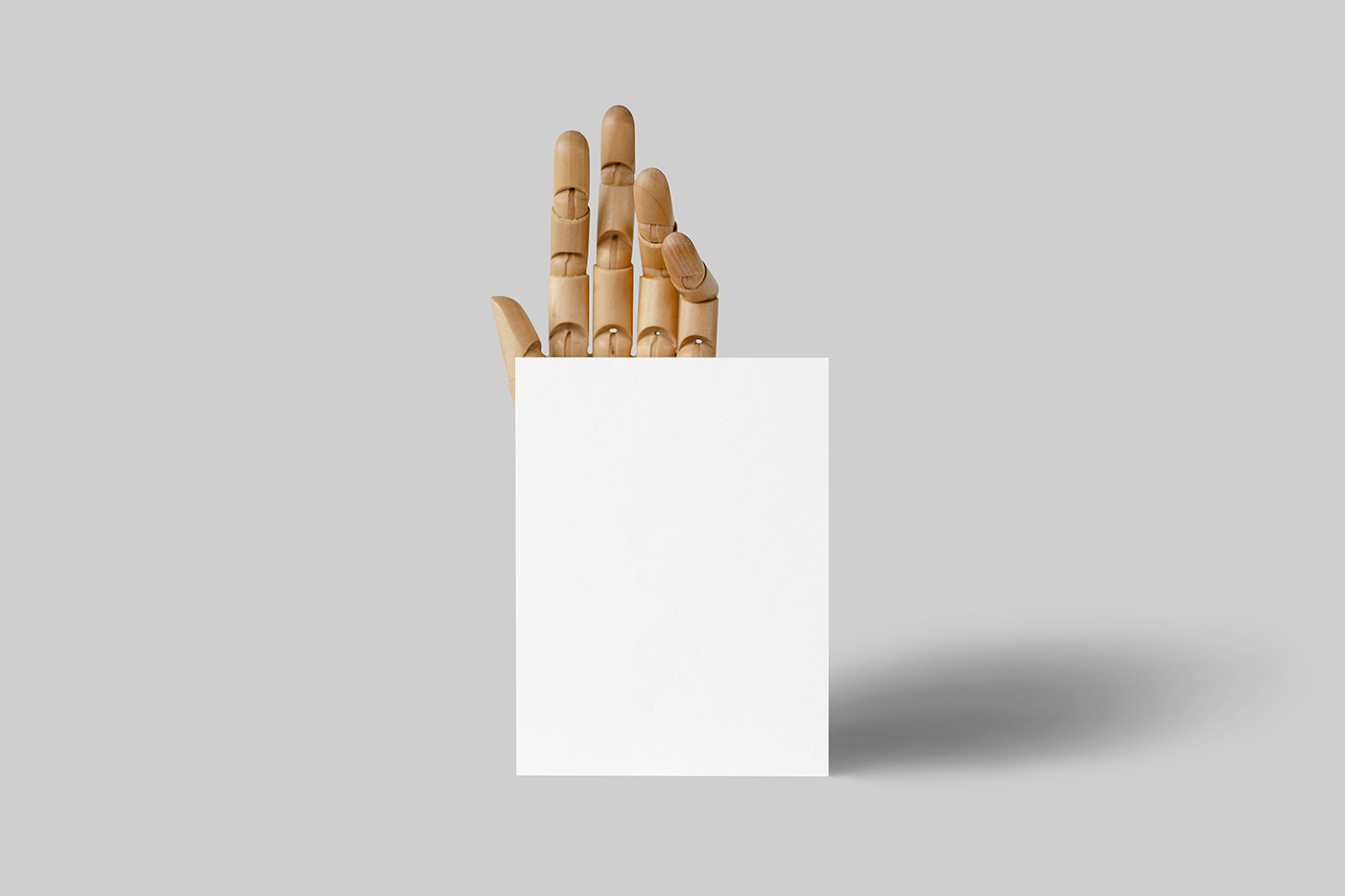 Free Card with Wooden Hand Mockup