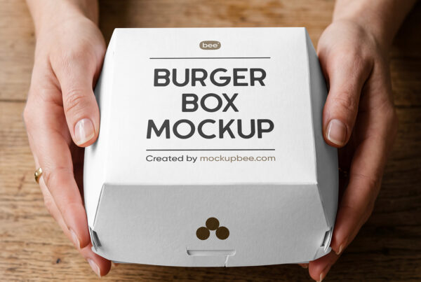 Free Burger Box in Hands Mockup