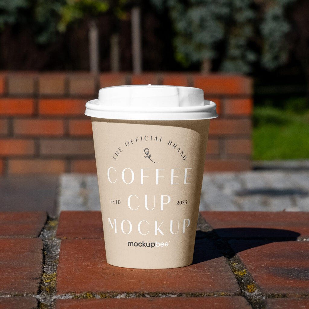 Free Paper Cup on Low Wall Mockup