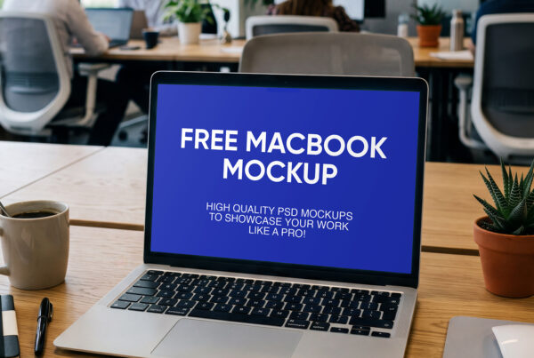 Free MacBook on Office Desk Mockup