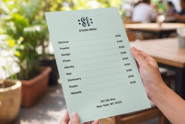 Free Menu Card in Hands Mockup