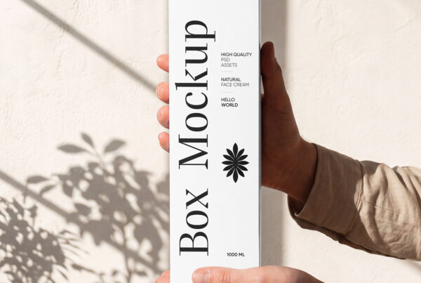 Free Vertical Box in Hands Mockup